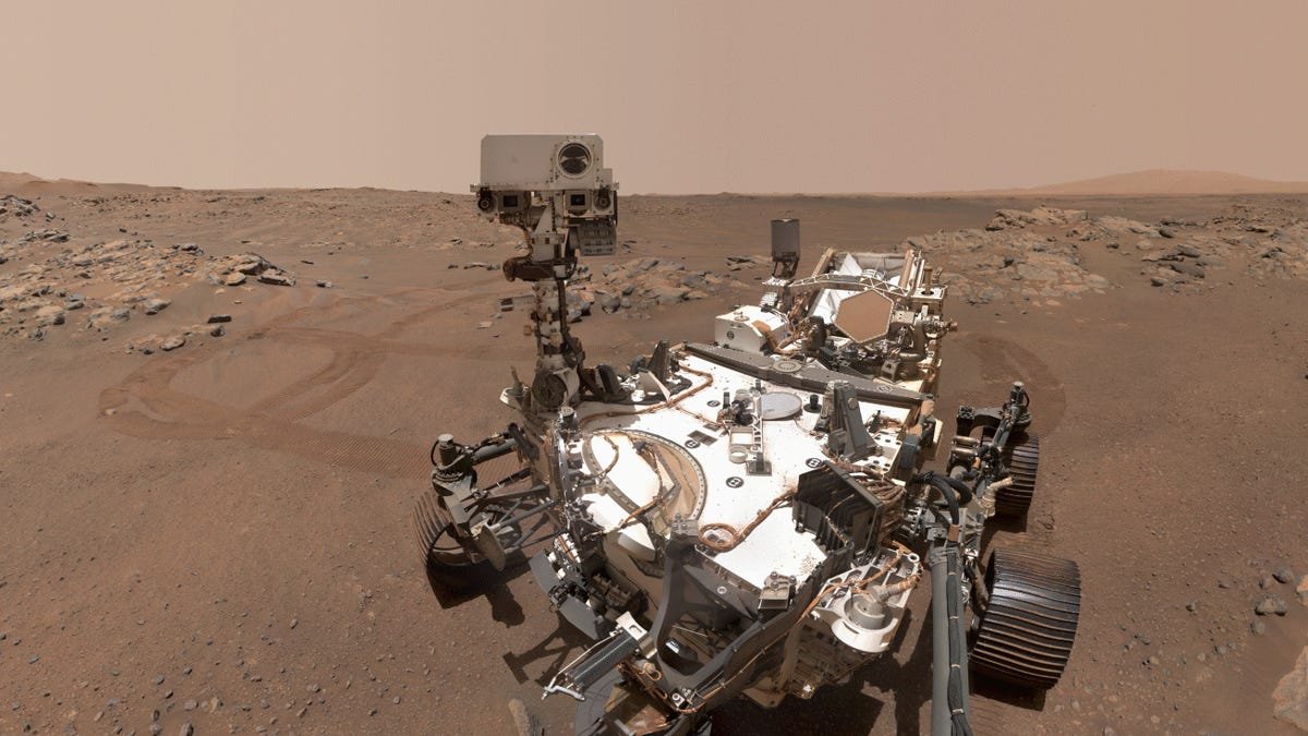 NASA Mars Rover Delivers Triumphant First Photos From Crater Rim