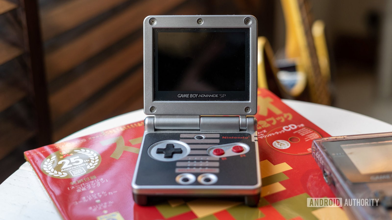 The Miyoo Flip can play PS1 games on a GBA SP-style clamshell